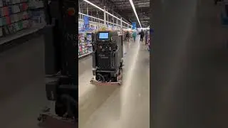 Self-driving robot floor cleaner at Walmart