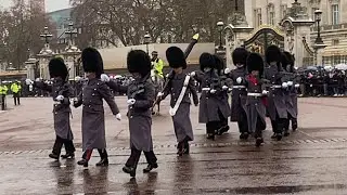 Scots Guards March to St James’s Palace on a Rainy Day
