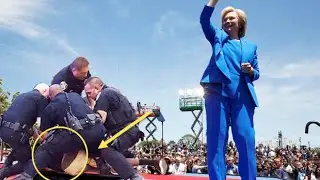 Moment Secret Service tackle animal rights protester to the ground when  Hilary Clinton on stage