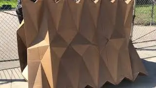 Cardborigami user closes the shelter.