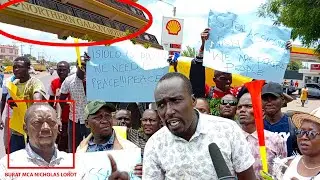 ARREST THE SHOOTER!!! ANGRY RESIDENTS PROTEST OUTSIDE HOTEL WHERE ISIOLO MCA WAS SHOT 4 TIMES
