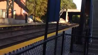Metra express through Winnetka with Private Car 553
