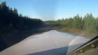 Cherokee Six 300 landing/takeoff from small gravel runway