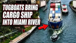 Tugboat Bringing Cargo Ship Into The Miami River 