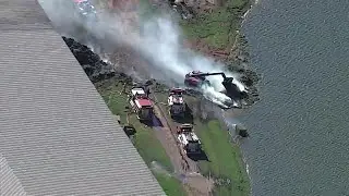 Crews from multiple agencies battle fire at Braum's Dairy Farm in Tuttle