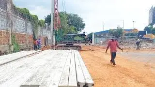 The foundations of massive buildings use concrete piles to support the weight of the structure.