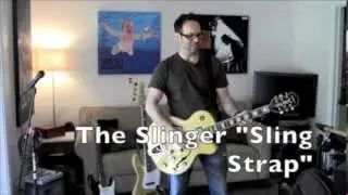 Ergonomic Guitar Strap that places a Portion of the Guitar Weight on Hips!