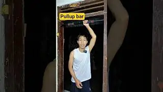 Hanging from a pull up bar