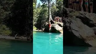 Epic Splash! 🌊🤯 Girl Takes the Plunge on a Giant Rope Swing into Crystal Blue Water!