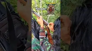 inserting ammunition for traditional weapons of the Kalimantan interior tribes