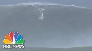 Garrett MacNamara Surfs Massive Wave In Portugal | NBC News