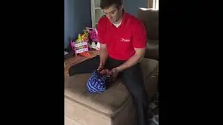 Chiropractor Altoona IA | Dr. Marcus Dawson Adjusting Newborn Child