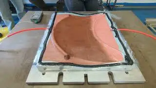 Recycled glass fibre mat: vacuum infusion of a curved part at CETMA