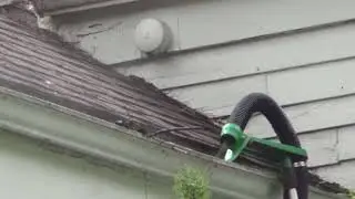 The Gutter Viper to clean two story  gutters without a ladder, available at www.ViperToolCompany.com