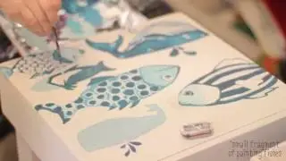 Painting fishes on the stool