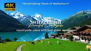 Breathtaking Views of Matterhorn Switzerland countryside scene with lush green meadows.