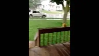 Two girls playing in the rain