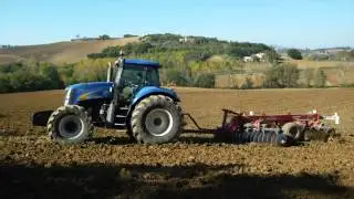NEWHOLLAND T8040 con erpice a dischi Jean de Bru
