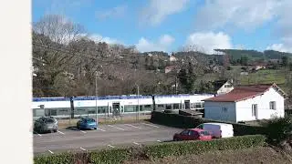 The train arrives in Chauffailles on a sunny winter day.