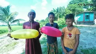 One by One: Kids Name the Color and Blow the Balloon