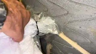 Самостоятельная изоляция полых стен с помощью фена, задувающего гранулы в стену