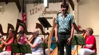 Moon River, sung by David Krak, accompanied by Brandywine Harp Orchestra
