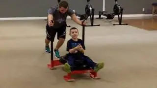 Jason Jaskolka rehabbing knee with sled push, trained by John Heary