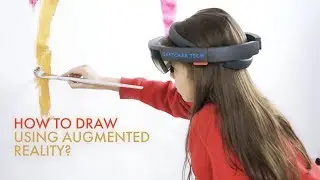 A kid paints a portrait using augmented reality and HoloLens. An amazing portrait!
