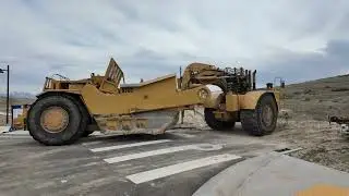 Bar 7 Unloading Cat 657E