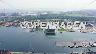 Inscription on video. Copenhagen, Denmark. Copenhagen Opera House. Glitch effect text, Aerial View,