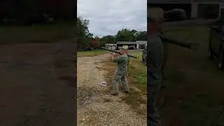 shooting a bazooka.