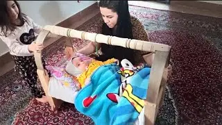 Bathing a baby: Nomadic style (Iranian nomadic life)
