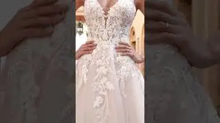 Soft Tulle A-Line Wedding Gown with Sheer V-Neck Bodice and Low Back