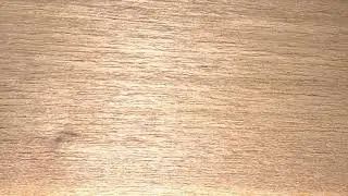 Hi-res chatoyance / chatoyancy on unfinished Freijo wood veneer