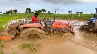 Kubota tractor stuck in mud | takes help New Holland and John Deere harvester | | kubota |