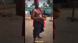 Ewe man pouring libation