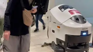 Demonstration experiment of autonomous mobile cleaning robot AMANO Japan