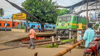Dangerous situation public run in front of high speed freight train at railgate