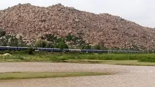 BRINDAVAN RIPS PAST MYSTIC TYAKAL LAKE (12640) :INDIAN RAILWAYS