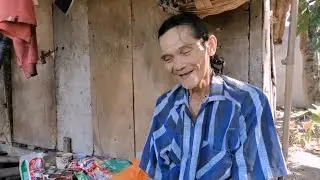 Helping disabled Lolo with groceries for a month, during the pandemic. He sings a beautiful song.