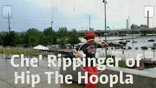 Broncos Superfan Che Rippinger of Hip The Hoopla~Hooping at Mile High Stadium Waterfall Fountain