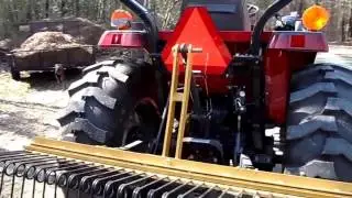 Tractor With Pine Needle Rake from Everything Attachments Vid-001