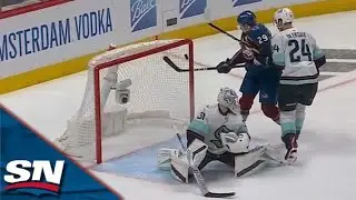 Avalanche's Nathan MacKinnon Swats In Goal After Kraken's Philipp Grubauer Misplays Puck