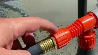 Spraying lawn for mosquitos.