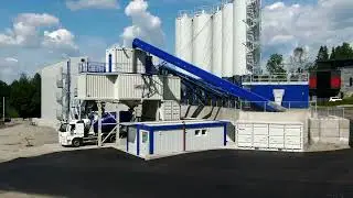 Tecwill Arcamix concrete mixing plant with VERTEC aggregate bin filling system