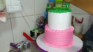 Pink paw patrol themed cake.. 2 tier chocomoist cake with 1dozen chocomoist cupcakes