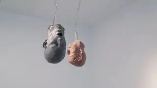 Bruce Nauman 'Hanging Heads # 1(Blue Andrew Mouth Open / Red Julie with Cap)', 1989