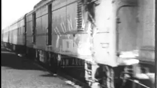 Steam loco into Union Station, Chicago, 1940's.  Archive film 93401