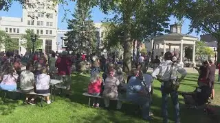 Northeast Ohio residents mourn Charlie Kirk, call for end to political violence at Elyria vigil