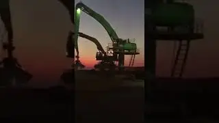 Seaport in operation, unloading of the vessel